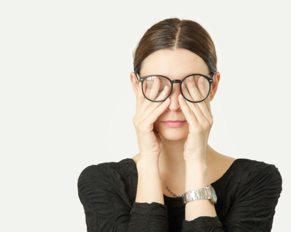 woman having tired eyes