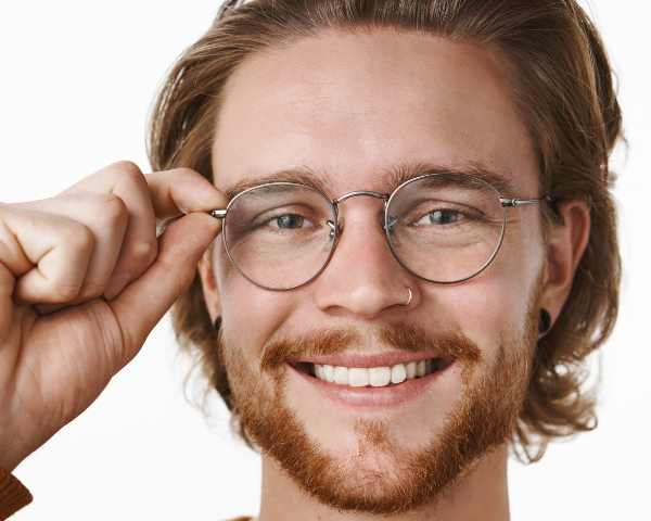 man wearing metal frame glasses