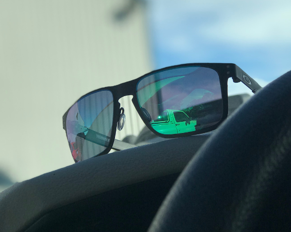 Oakley sunglasses on car roof