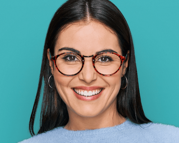 woman wearing oval tortoiseshell glasses