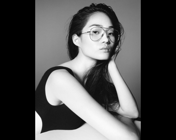woman wearing aviator saint laurent eyeglasses