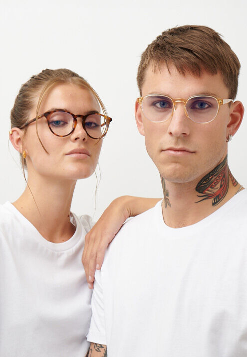 Models wearing sunglasses and eyeglasses