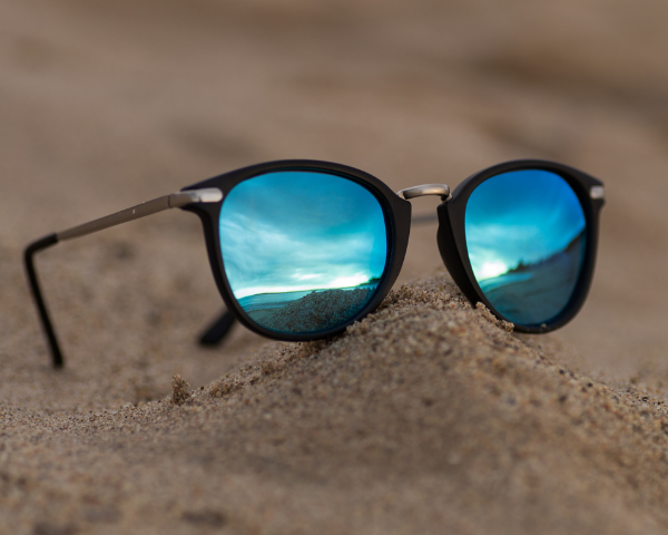 Mirrored sunglasses with blue lenses