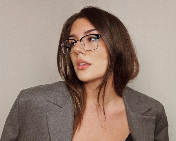 woman wearing black wireframe browline glasses
