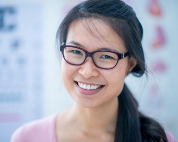 woman wearing small rectangle frames