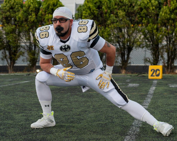 football player wearing prescription sport glasses