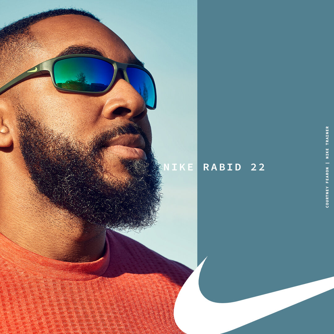 Man wearing Nike mirrored sunglasses