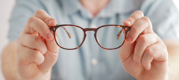 Hands holding glasses