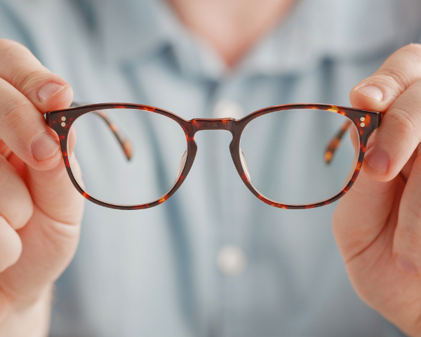 Hands holding glasses