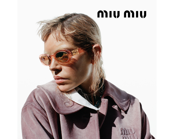 woman wearing Miu Miu sunglasses