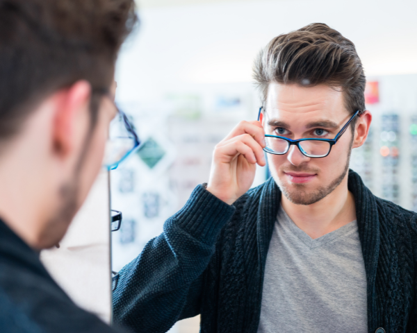 man wearing transition glasses
