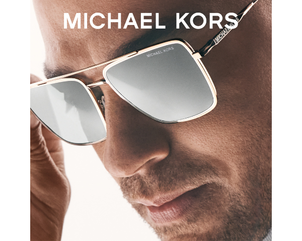 Man wearing Michael Kors sunglasses