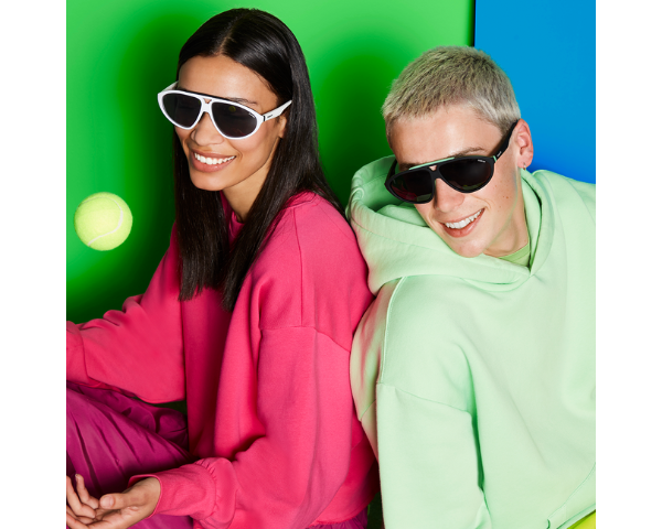 man and woman wearing floral design Gucci