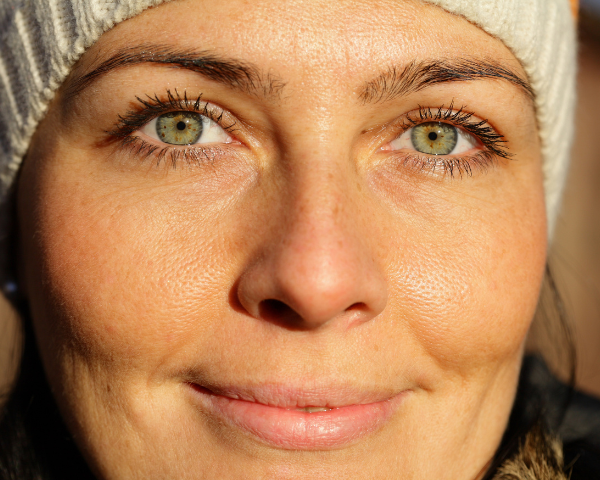 Woman with green eyes smiling