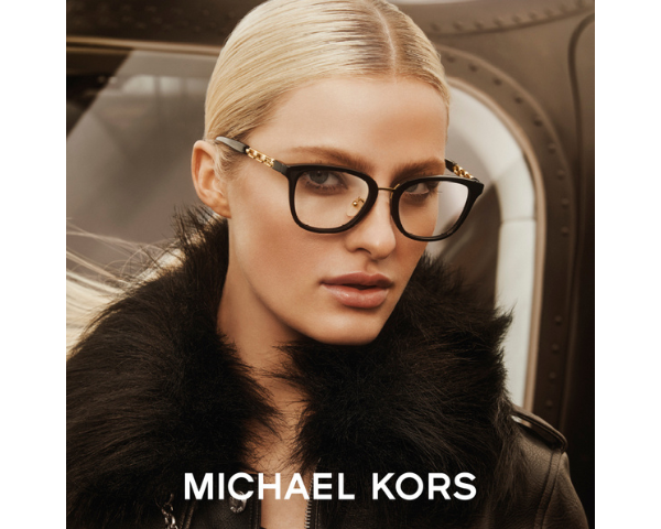 Woman wearing Michael Kors sunglasses