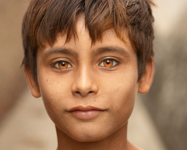 Young boy with amber eyes