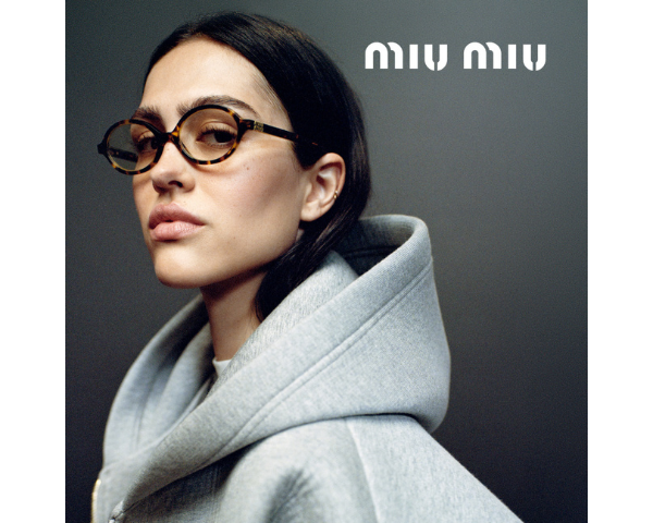 woman wearing Miu Miu eyeglasses