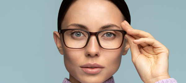 woman with blue eyes wearing eyeglasses