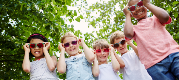 Kids showing their sunglasses