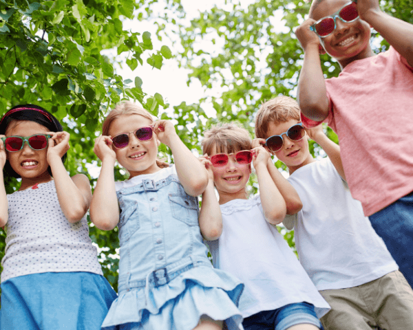 Kids showing their sunglasses