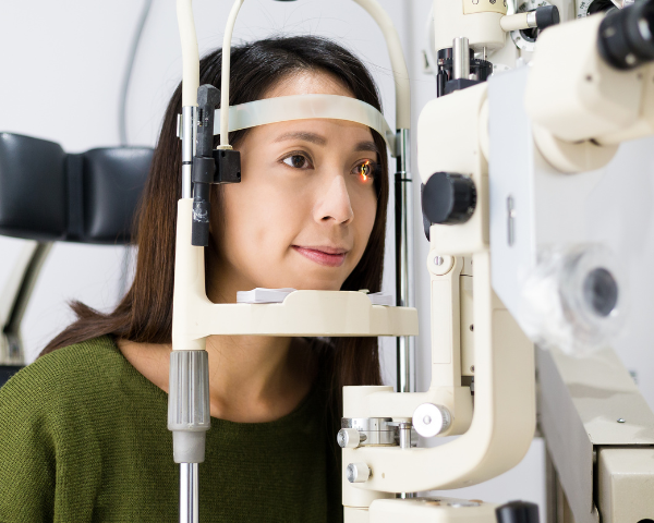 Woman getting eyes tested