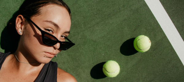 woman playing tennis sports