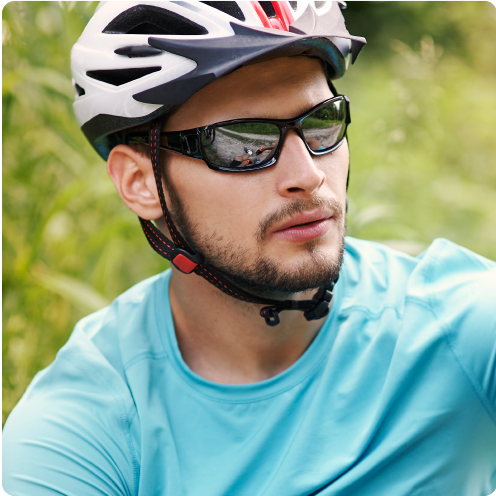Man cycling wearing sunglasses