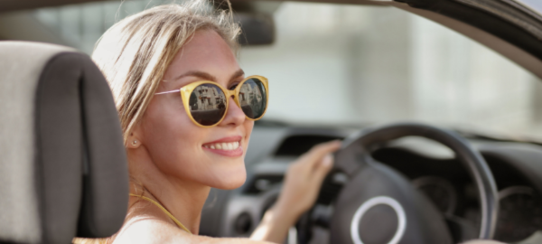 woman driving in sunglasses
