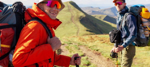 two men hiking wearing sports sunglasses