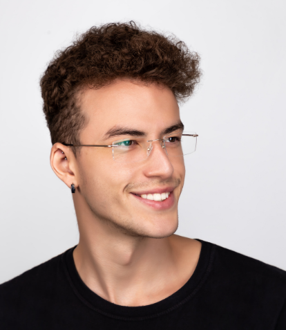 youthful man wearing rimless glasses