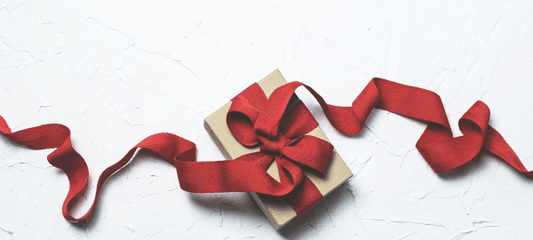 brown parcel with red ribbon