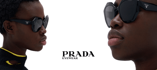 two black models wearing prada symbole glasses