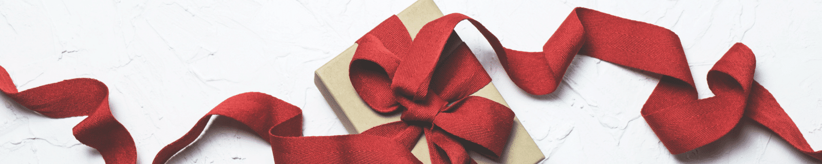 brown parcel with red ribbon