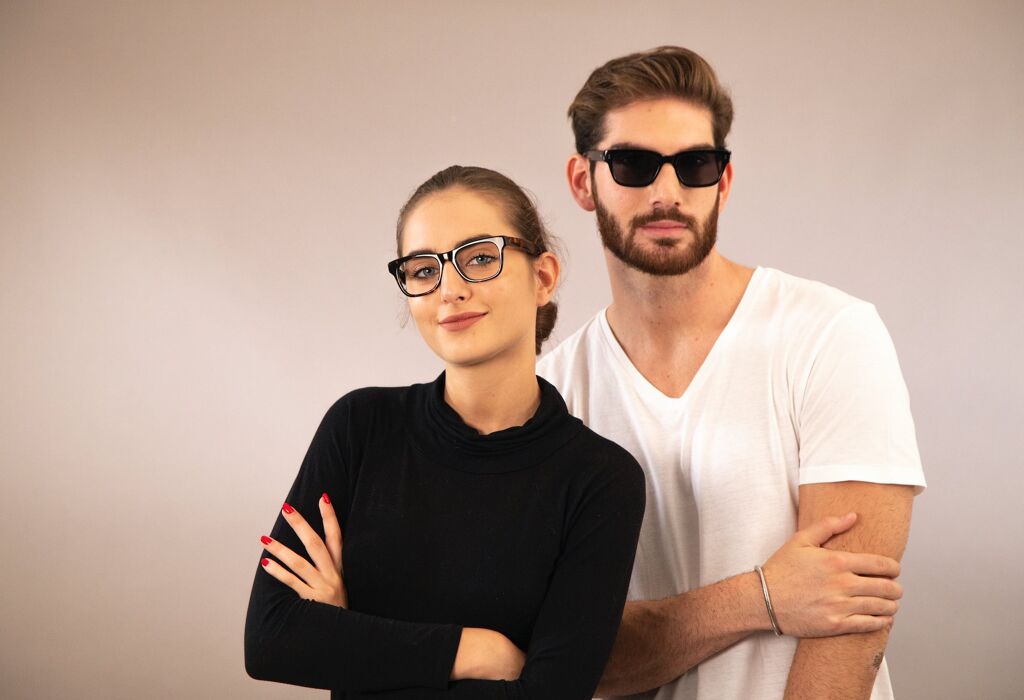 man and woman wearing glasses and sunglasses