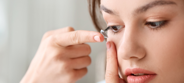 Can you wear colored contacts over regular contacts?
