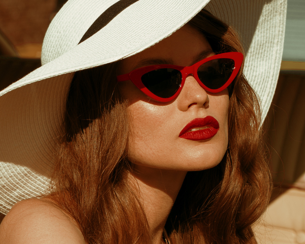 woman wearing vintage cat eye sunglasses