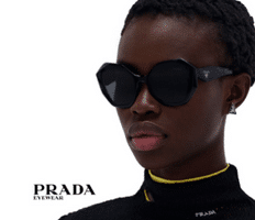 stylish model wearing black prada sunglasses