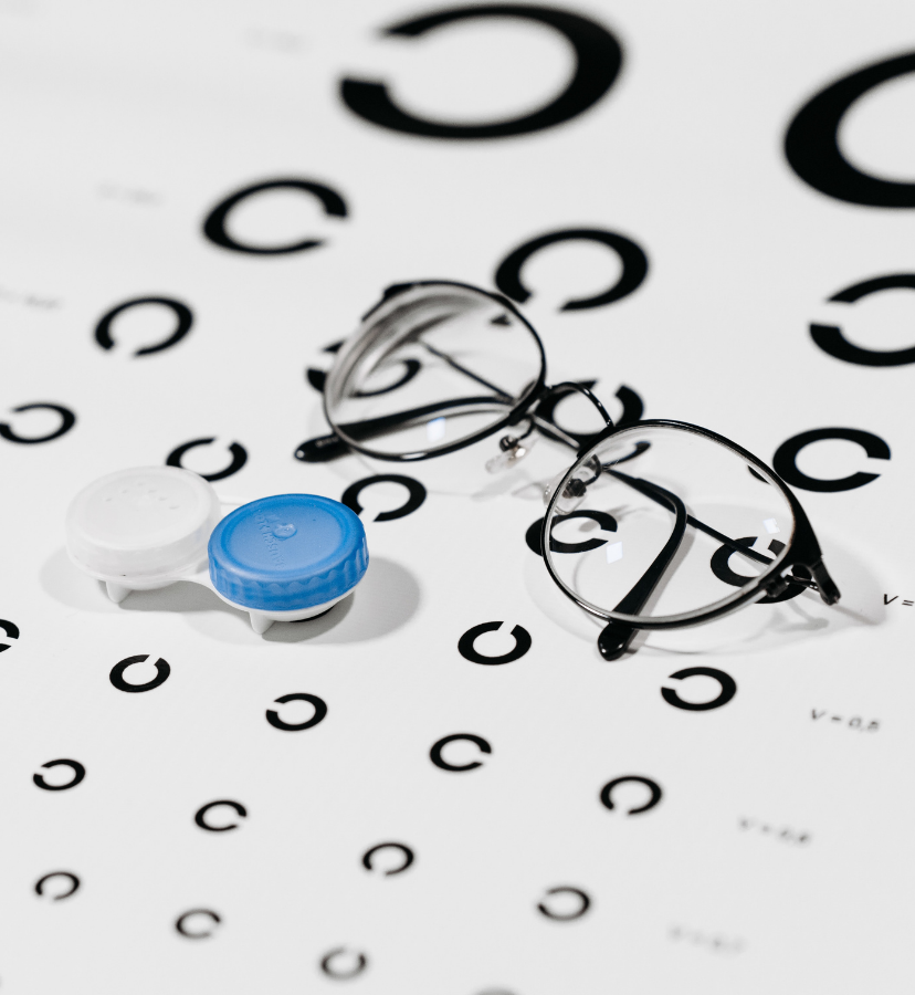 eye chart, glasses and contact lenses