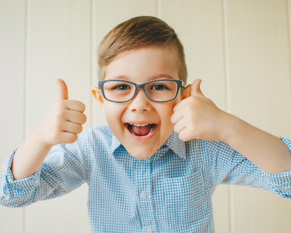 child with glasses