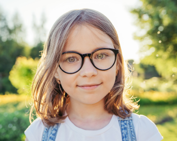 child with glasses