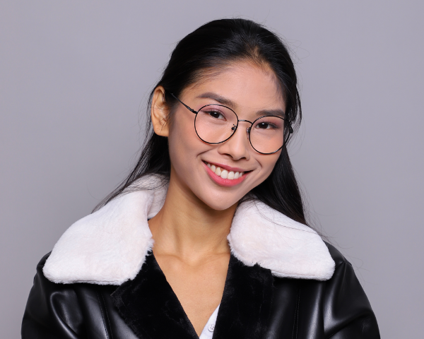 model wearing asian-fit glasses and smiling