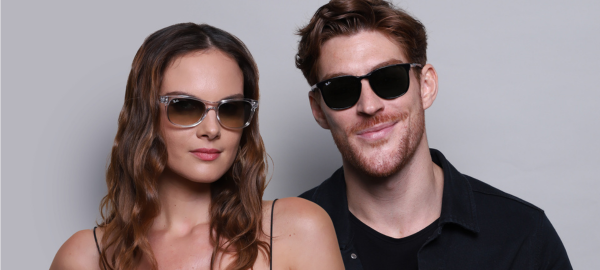man and woman wearing Ray-Ban sunglasses lenses