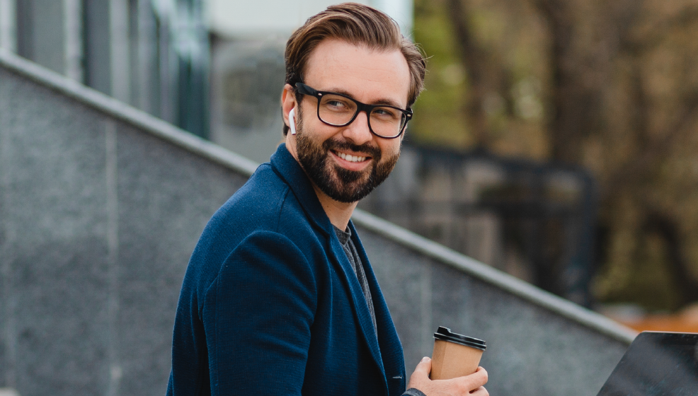 man smiling with glasses