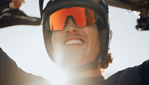 image of a man playing sports wearing sunglasses with mirrored lenses