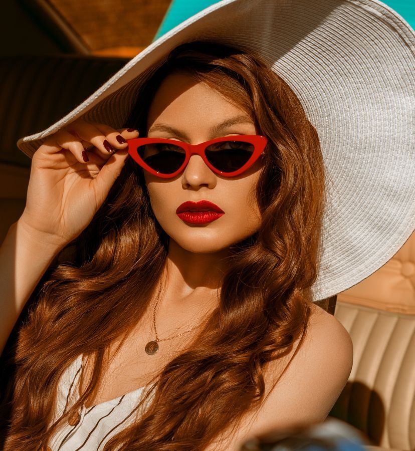 woman wearing cat eye sunglasses