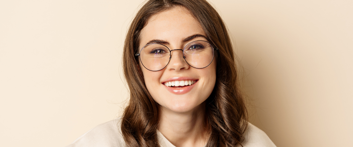 woman wearing metallic frame glasses