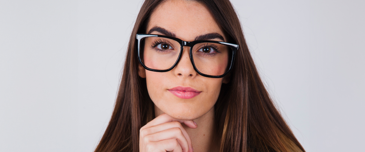woman wearing oversize glasses