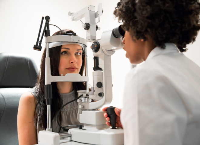 woman getting her eyes checked at the eye doctor