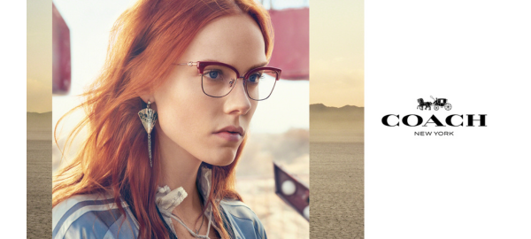 woman wearing coach glasses