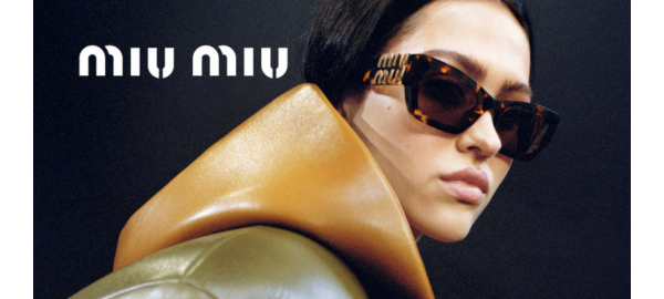 woman wearing Miu Miu sunglasses